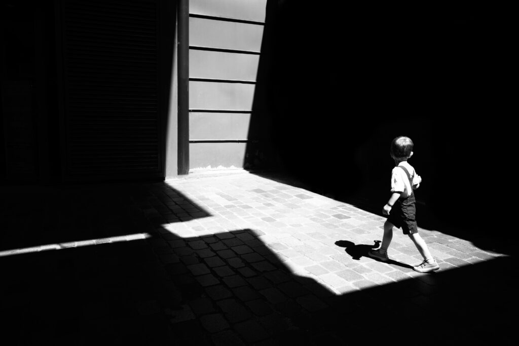 kid alone black and white
